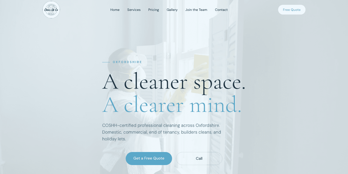 Clean Up Co website homepage with the headline "A cleaner space. A clearer mind."